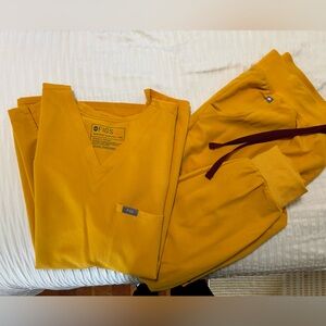 Figs darker dandelion Scrub Top and pants.